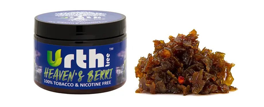 Jar of Urth Tree herbal shisha next to loose Urth Tree shisha