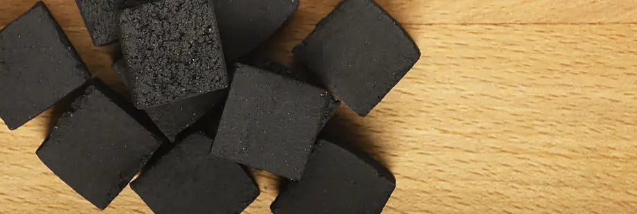 Close up of pieces of natural hookah charcoal