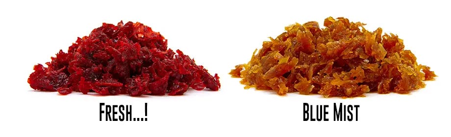 Loose Al Fakher shisha tobacco next to loose Starbuzz shisha tobacco