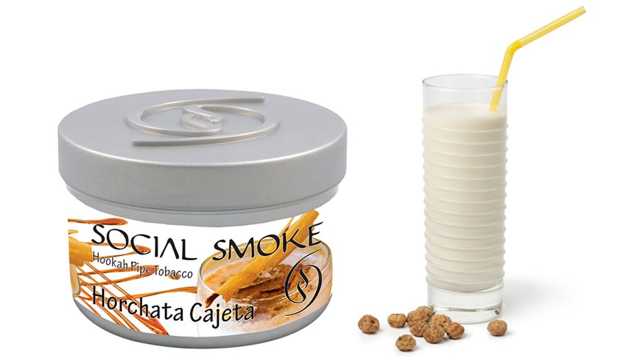 Social Smoke Horchata Cajeta shisha jar next to glass of horchata